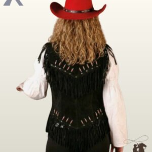 Rear view of a model wearing a black suede western vest featuring a V-shaped fringed yoke, beaded bone pipe embellishments, and a fringed hem.