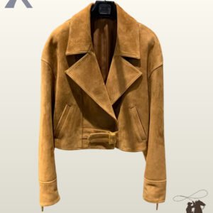 Women's tan suede cropped biker jacket with wide collar lapels, belted hem, zipper cuffs, and double-breasted style overlap.