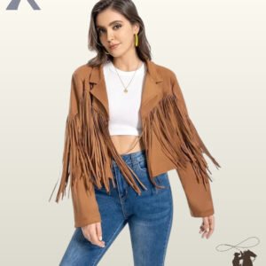 Front view of a smiling model wearing an open camel tan suede western fringe jacket styled over a white crop top and blue jeans.