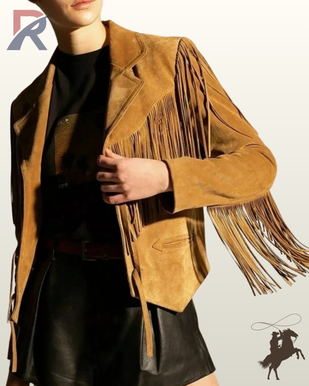 Front close-up view of a model wearing a camel tan suede western fringe jacket featuring tailored notched lapels, chest fringe, and arrow-stitched welt pockets.