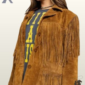 Front view close-up of a model wearing an open cognac brown suede western fringe jacket layered over a graphic t-shirt.