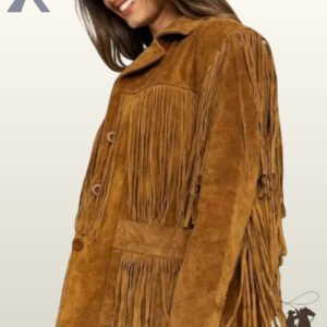 Angled side view of a model smiling in a women's cognac brown suede western fringe jacket with button closures and fringed patch pockets.