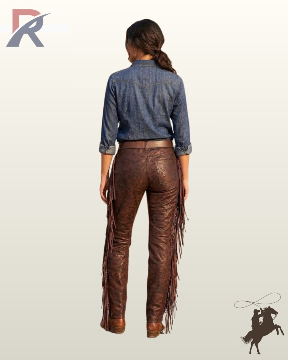 Full rear view of a model wearing women's distressed dark brown leather pants featuring back pockets, a brown leather belt, and side leg fringe.