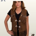 Women's native western style brown suede vest displaying front chest fringe, silver engraved conchos with leather ties, and a fringed bottom hem.