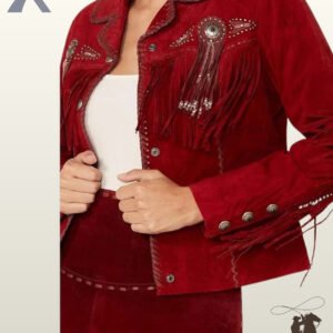 Women's red burgundy suede cowgirl jacket highlighting silver snap buttons, chest fringe, silver cuff buttons, and whipstitched lapel collar.