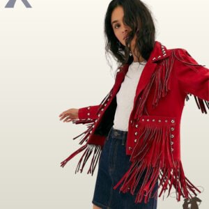 Full front view of a model wearing a women's red suede western jacket with studded pockets, silver studs on cuffs and lapels, cascading hem fringe, and a denim skirt.