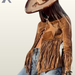 Angled front view of a model wearing an open lace-up tan suede western jacket featuring star patches, studded fringe waist, and blue jeans.