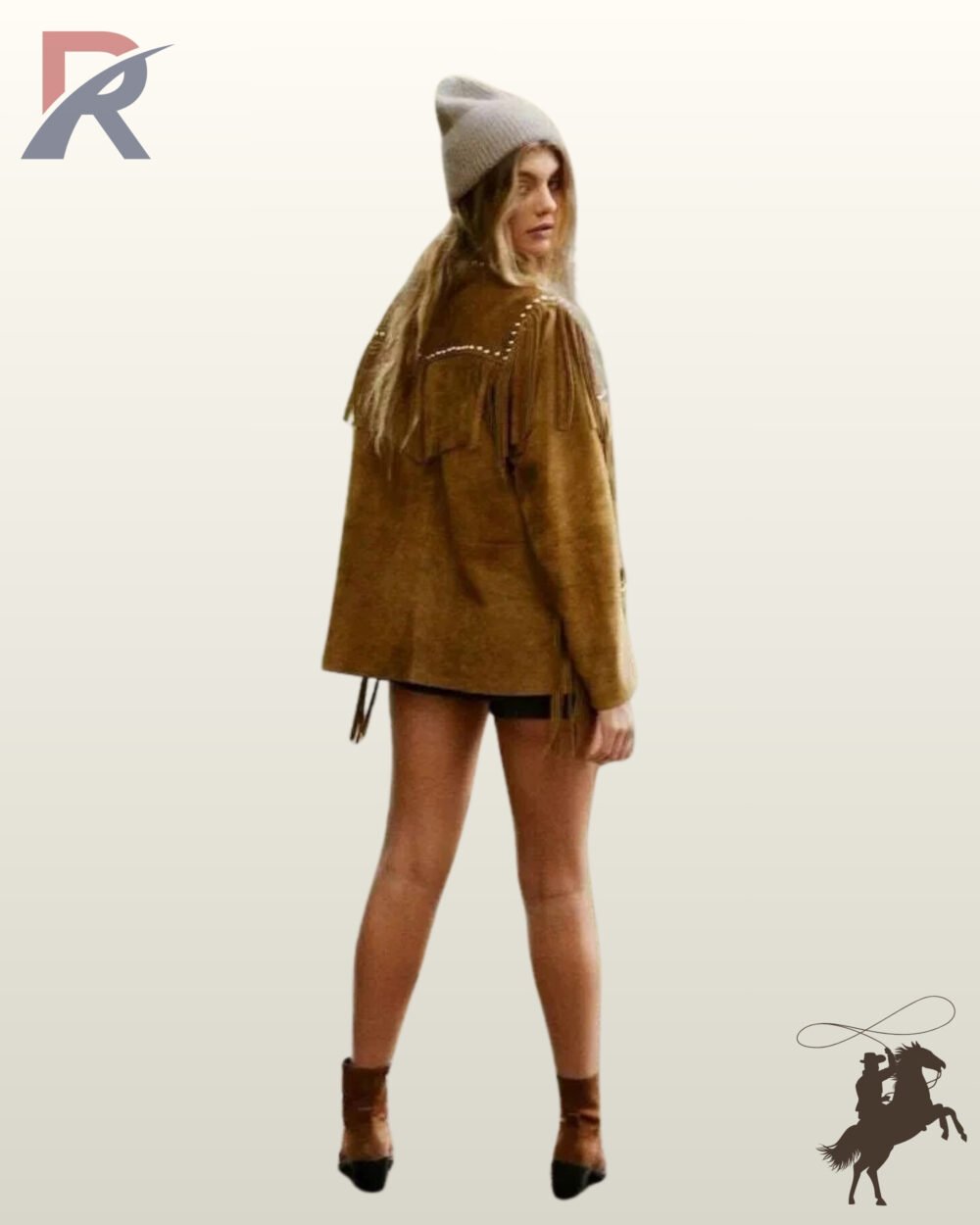 Rear full-length view of a model wearing a women's tan suede western fringe jacket with silver studs, paired with a beanie and ankle boots.